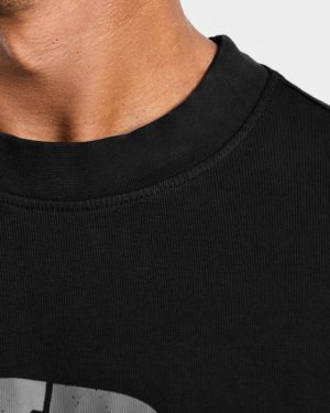Elite Oversized T-Shirt: The Ultimate Black/Charcoal Gym Essential