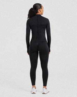 Empower Seamless 1/2 Zip Jacket - Black: The Ultimate Sculpting Gym Essential