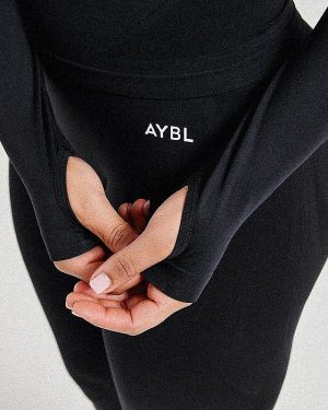 Empower Seamless 1/2 Zip Jacket - Black: The Ultimate Sculpting Gym Essential