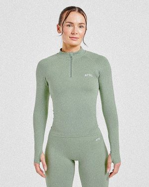 Empower Seamless 1/2 Zip Jacket - Grove Green: The Ultimate Sculpting Activewear