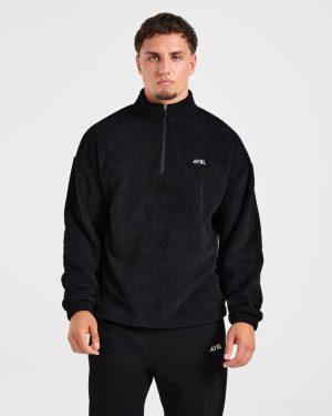 Essential 1/4 Zip Fleece - Black: The Ultimate Oversized Warmth Solution