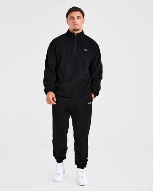Essential 1/4 Zip Fleece - Black: The Ultimate Oversized Warmth Solution