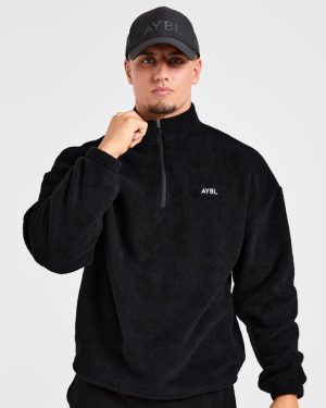 Essential 1/4 Zip Fleece - Black: The Ultimate Oversized Warmth Solution