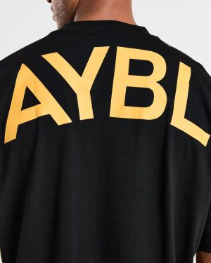 Essential Oversized T Shirt - Black/Mango Yellow: The Ultimate Comfort Upgrade