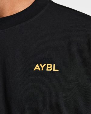 Essential Oversized T Shirt - Black/Mango Yellow: The Ultimate Comfort Upgrade