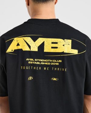 Orbit Oversized T-Shirt: The Ultimate Black/Yellow Streetwear Essential