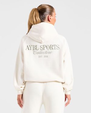 Sports Collective Oversized Hoodie - Off White/Green: The Ultimate Comfort Staple
