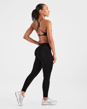 Adapt Seamless Strappy Sports Bra - Black: The Ultimate Low-Impact Companion