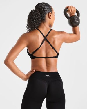 Adapt Seamless Strappy Sports Bra - Black: The Ultimate Low-Impact Companion